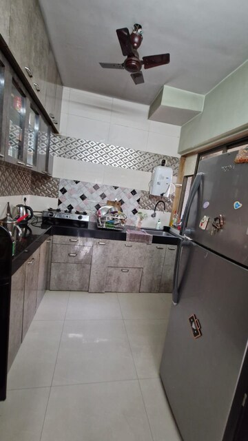 Kitchen in 2 BHK Apartment at Runwal Garden City, Balkum Pada – for Rent