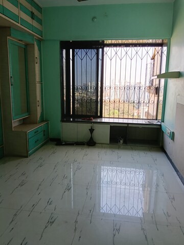 Bedroom in 2 BHK Apartment at Cosmos Heritage, Manpada – for Sale