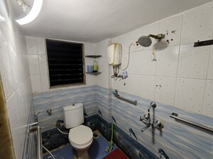 Master Bedroom in 2 BHK Apartment at Aakanksha Garden, Manpada – for Rent