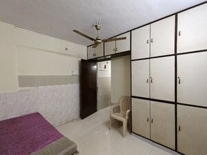 Kitchen in 2 BHK Apartment at Aakanksha Garden, Manpada – for Rent