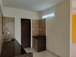 Living Room in 2 BHK Apartment at Om Tropica, Ravet – for Sale