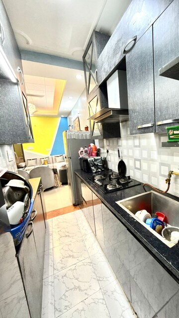 Kitchen in 2 BHK Apartment at Golf Green Apartments, Sector 19 Dwarka – for Rent