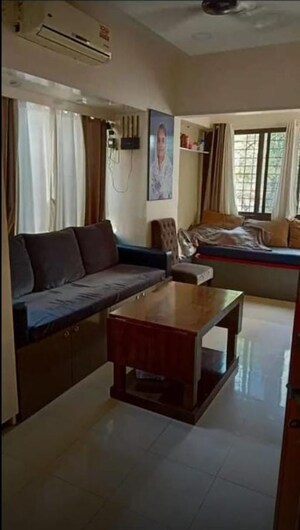 Living Room in 1 BHK Apartment at Saket CHS Malad East, Malad East – for Rent