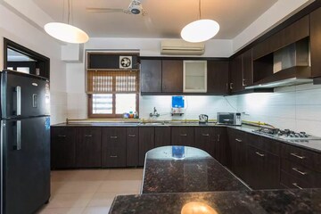Kitchen in 4 BHK Apartment at Jaypee Green Earth Court, Jaypee Greens – for Rent