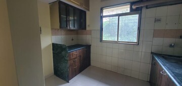Kitchen in 1 BHK Apartment at Swastik Residency 1, Ghodbunder Road – for Sale