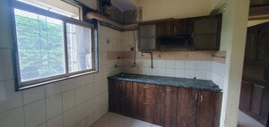 Kitchen in 1 BHK Apartment at Swastik Residency 1, Ghodbunder Road – for Sale
