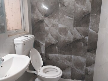 Bathroom in 2 BHK Apartment at Pivotal Riddhi Siddhi, Sector 99 – for Rent