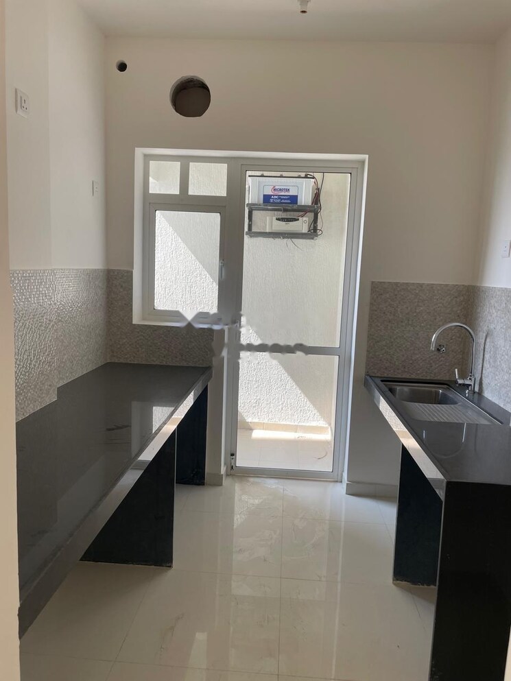 Kitchen, godrej-nurture-pune 2 Bedroom 825 Sq.Ft. Apartment In Mamurdi Pune 9521448