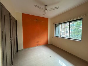 Bedroom in 1 BHK Apartment at Sai Marigold CHSL, Kavesar – for Rent