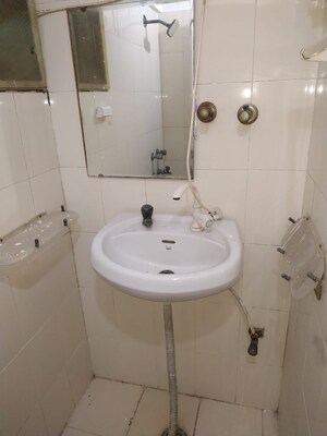 Bathroom in 1 BHK Apartment at Jasola Vihar – for Sale