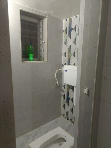 Bathroom in 1 BHK Apartment at Sai Rydam Grapes Tower, Nalasopara West – for Rent