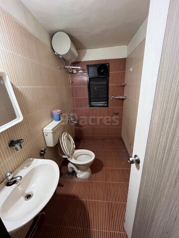 Bathroom in 2 BHK Apartment at Ratan Prestige, Kharadi – for Rent