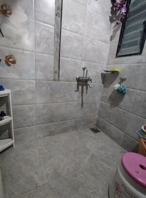Bathroom in 2 BHK Apartment at Kumar Girija Shankar Vihar, Karve Nagar – for Sale