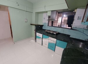 Kitchen in 2 BHK Apartment at D S Shubham Apartment, Dhanori – for Rent