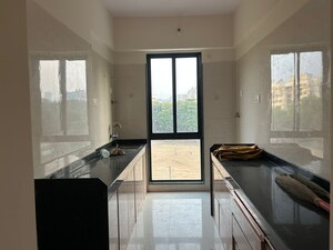 Kitchen in 2 BHK Apartment at Kavya Hill View CHS, Anand Nagar – for Sale