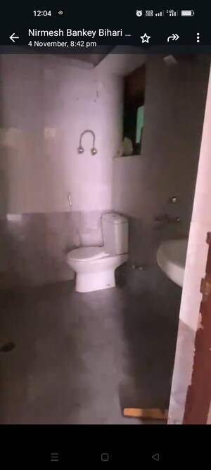 Bathroom in 2 BHK Apartment at Shyam Bankey Bihari Sharnam, Raj Nagar Extension – for Sale