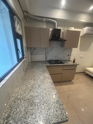 Kitchen in 2 BHK Builder Floor at Suncity Vatsal Valley, Gwal Pahari – for Sale