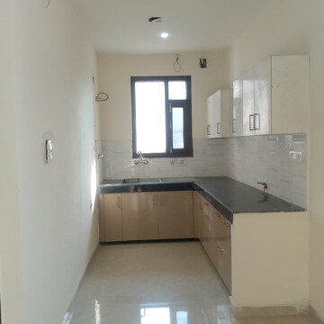 Kitchen in 3 BHK Builder Floor at Dhakoli – for Sale