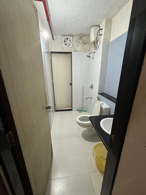 Bathroom in Studio Apartment at Paranjape Blue Ridge, Hinjewadi – for Sale