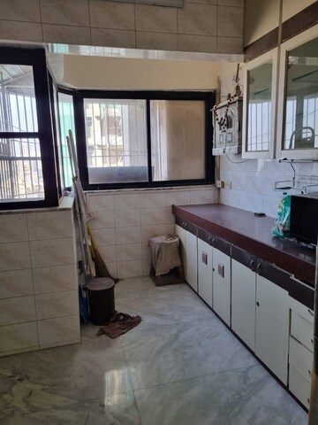 Kitchen in 2 BHK Apartment at Movie Tower, Andheri West – for Rent
