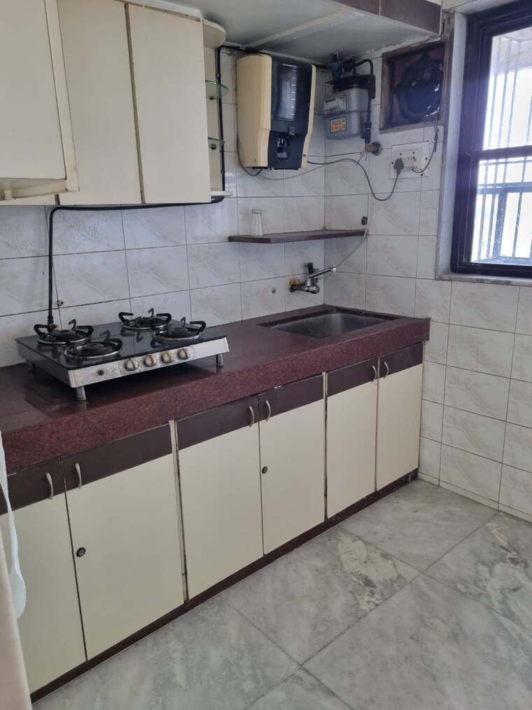 Kitchen, movie-tower 2 Bedroom 700 Sq.Ft. Apartment In Andheri West Mumbai 9522606