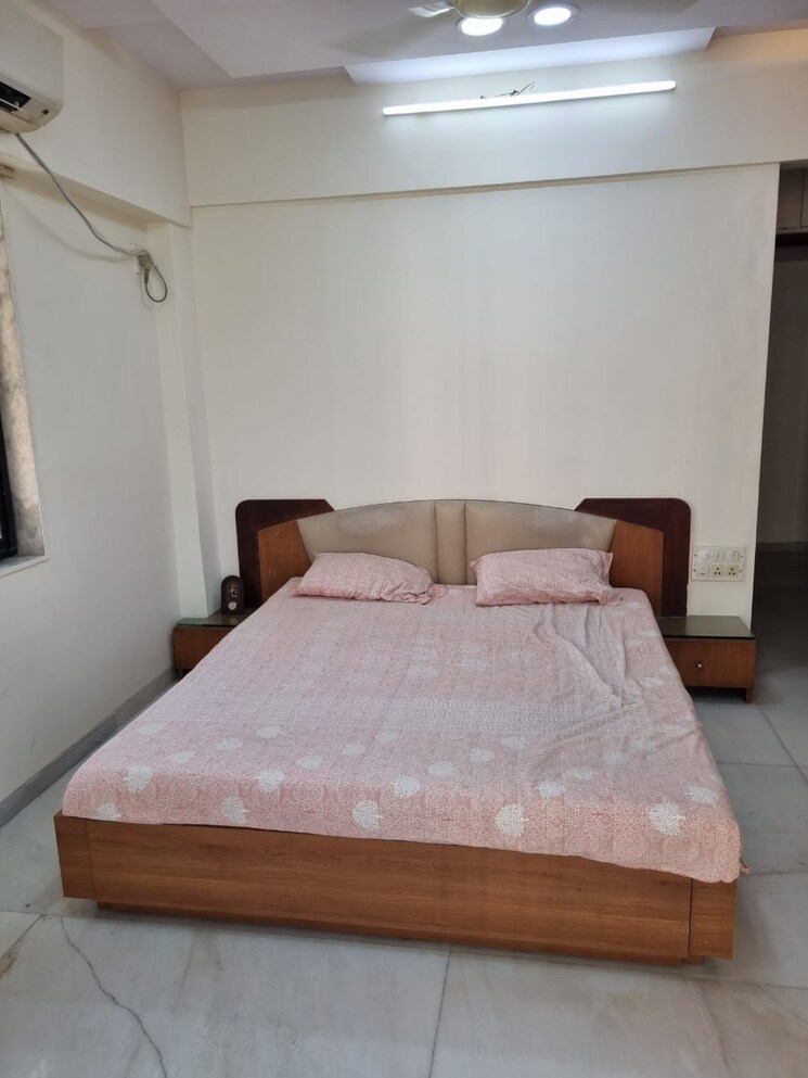 Bedroom, movie-tower 2 Bedroom 700 Sq.Ft. Apartment In Andheri West Mumbai 9522606