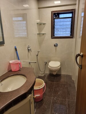 Bathroom in 2 BHK Apartment at Movie Tower, Andheri West – for Rent
