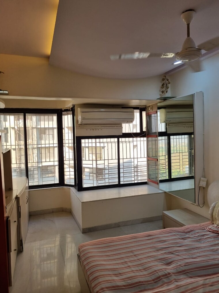 Bedroom, movie-tower 2 Bedroom 700 Sq.Ft. Apartment In Andheri West Mumbai 9522606