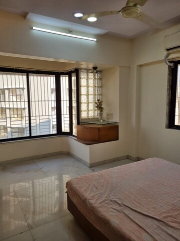 Bedroom in 2 BHK Apartment at Movie Tower, Andheri West – for Rent