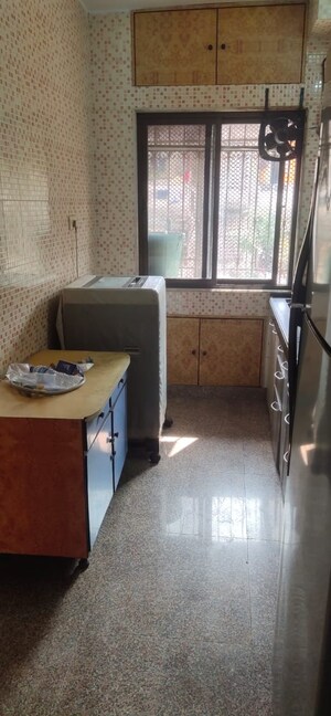 Living Room in 2 BHK Apartment at Vrindavan CHS Malad, Malad East – for Rent