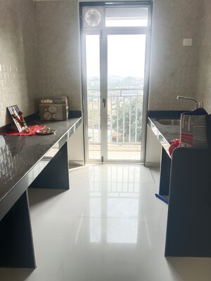 Kitchen in 2 BHK Apartment at Ajmera Crosstown One, Kalyan West – for Rent