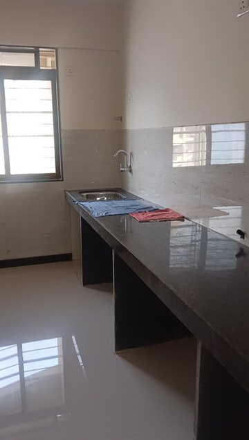 Kitchen in 2 BHK Apartment at Acme Ozone, Manpada – for Rent
