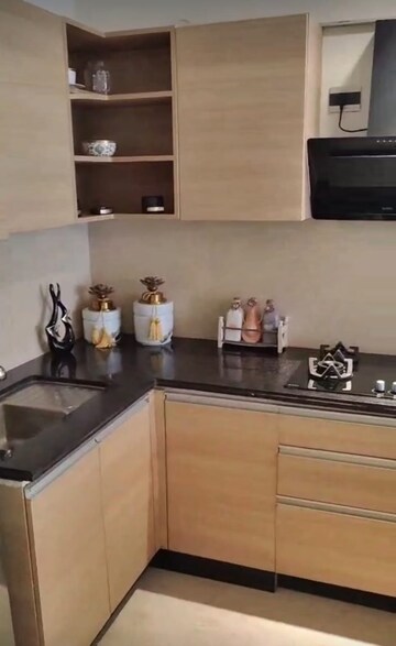 Kitchen in 2 BHK Apartment at Omkar Vive, Kurla – for Rent