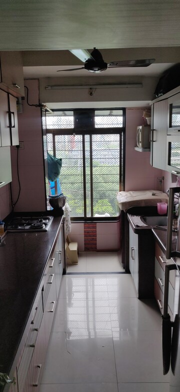 Kitchen in 3 BHK Apartment at Chheda Heights, Bhandup West – for Sale
