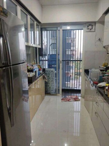 Kitchen in 2 BHK Apartment at Courtyard by Narang Realty and The Wadhwa Group, Pokhran Road No Two – for Rent