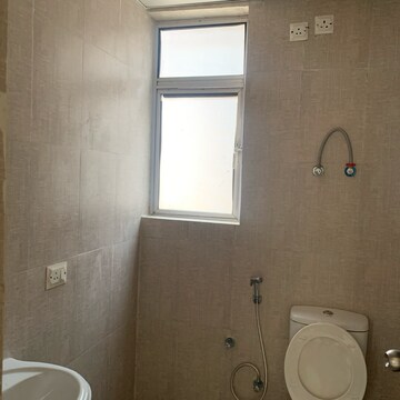 Bathroom in 1 BHK Apartment at Aditya Urban Homes, Shahpur Bamheta – for Rent