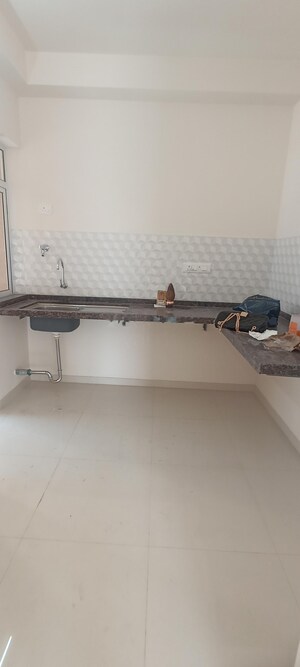 Kitchen in 3 BHK Apartment at Godrej Green Cove, Mahalunge – for Rent