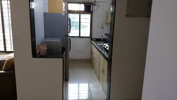 Kitchen in 2 BHK Apartment at Neptune Living Point, Bhandup West – for Rent