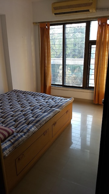 Bedroom in 2 BHK Apartment at Neptune Living Point, Bhandup West – for Rent