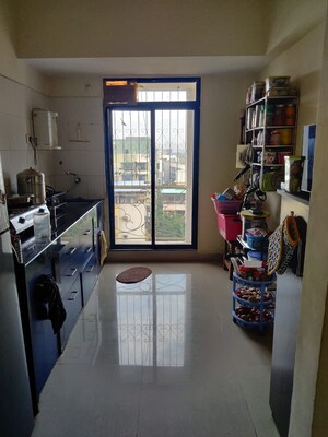 Kitchen in 2 BHK Apartment at Yasho Deep Heights, Gothivali Village – for Sale