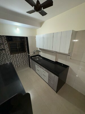 Kitchen in 2.5 BHK Apartment at Sudarshan Sky Garden Mumbai, Anand Nagar – for Rent
