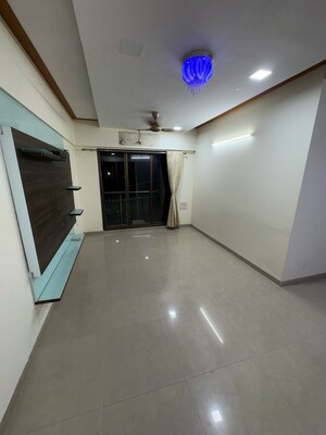 Living Room in 2.5 BHK Apartment at Sudarshan Sky Garden Mumbai, Anand Nagar – for Rent