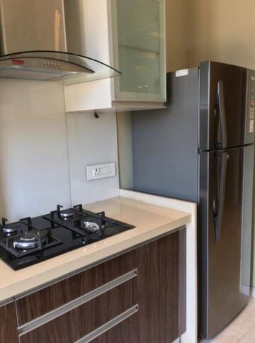Kitchen in 4 BHK Apartment at Harmony Signature Towers, Owale – for Rent