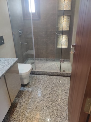 Bathroom in 4 BHK Builder Floor at Green Park – for Rent