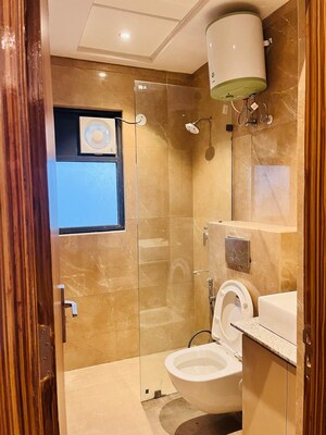 Bathroom in 3 BHK Apartment at Suncity Vatsal Valley, Gwal Pahari – for Rent