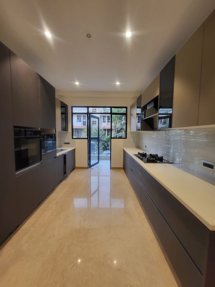 Kitchen, omaxe-designer-villas-mayfield-garden 4 Bedroom 4500 Sq.Ft. Builder Floor In Sector 51 Gurgaon 9526369