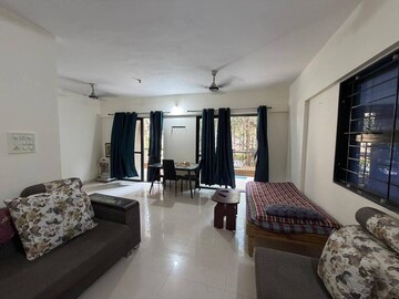 Living Room in 2 BHK Apartment at Magarpatta Sylvania, Hadapsar – for Sale