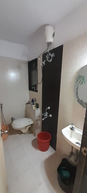 Bathroom in 2 BHK Apartment at Tarangan Towers, Samata Nagar – for Rent