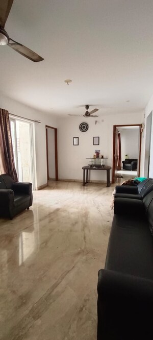 Living Room in 2 BHK Apartment at Marvel Fria, Wagholi – for Rent