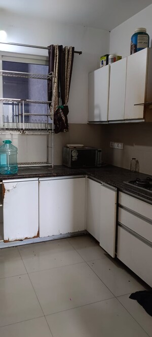 Kitchen in 2 BHK Apartment at Marvel Fria, Wagholi – for Rent